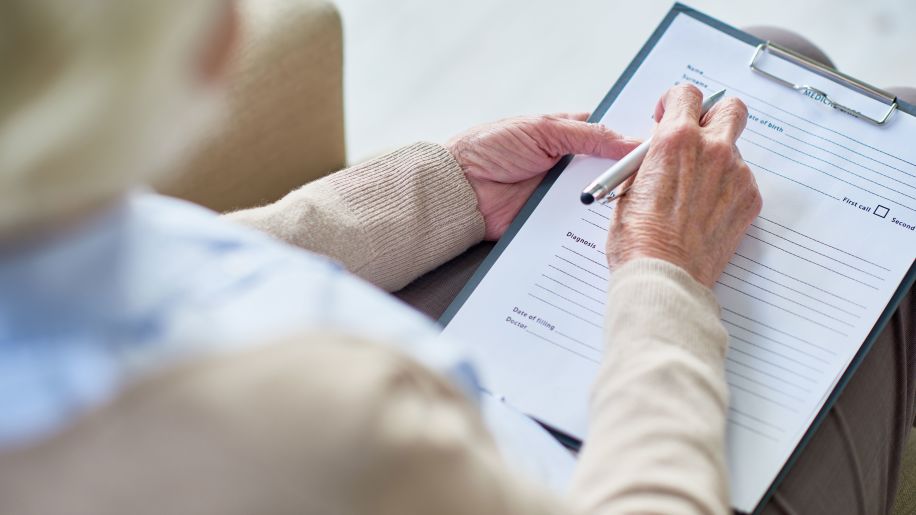 Donor signing forms, woman at doctor appointment, medical consultation